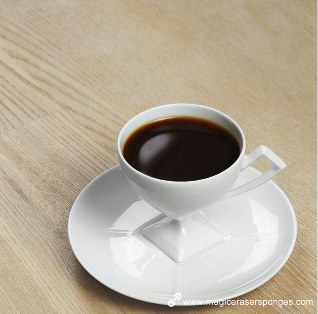 white color cup with coffee